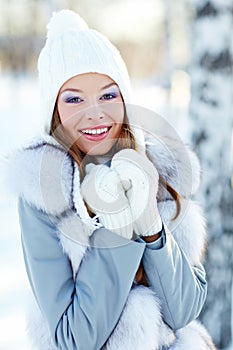 Attractive young woman in wintertime outdoor