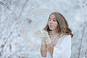 Attractive young woman in wintertime outdoor