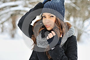 Attractive young woman in wintertime - outdoors portrait