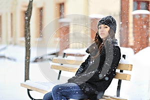 Attractive young woman in wintertime - outdoors portrait photo