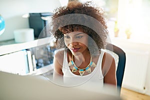 Attractive young woman working on a computer