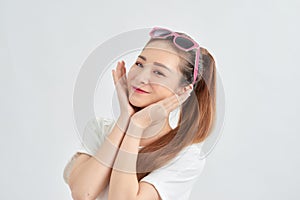 Attrative young Asian girl portrait over white background