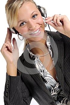 Atttractive blonde businesswoman with headphone