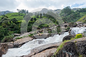 Atukkad Waterfalls near Munnar in Kerala, South India on cloudy day in rain season
