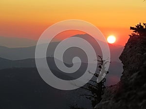 An atumn sunset from a high cliff photo
