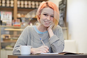 Atural light portrait of young attractive smiling student girls