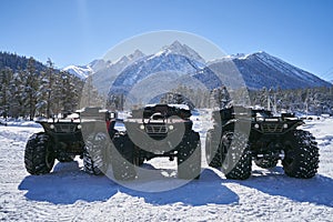 ATV with big wheels to for rent in mountain at winter