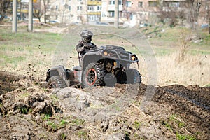 ATV, buggy, quad and UTV offroad vehicle rally in dust with mud splash. Extreme, adrenalin. 4x4