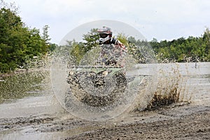ATV in mudhole