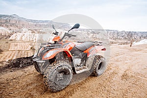 ATV Quad Bike in front of mountains landscape