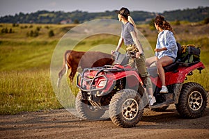 ATV Quad Bike of mountains.Girl have fun at journey