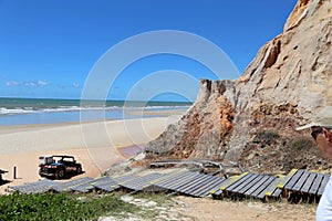 ATV quadricycle tourism on the cliffs of Morro Branco, state of Ceara, Brazil.