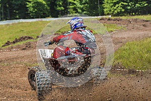 ATV racer in the mud