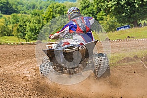 ATV racer in the mud