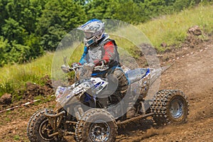 ATV racer in the mud