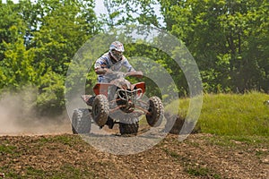 ATV racer in the mud