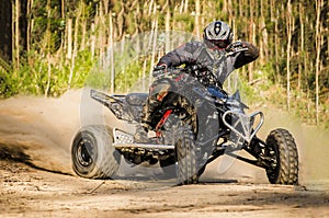 ATV racer takes a turn during