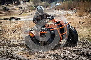 ATV rider in hard dirt track. Extreme ride