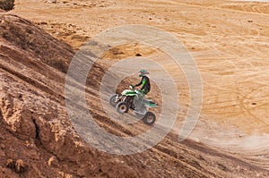 ATV rider uphill