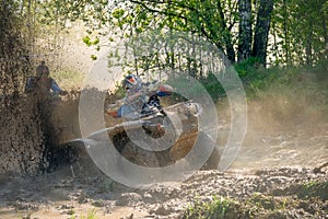 The ATV tries to get out of the dirt