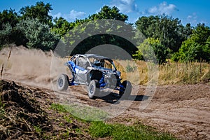 ATV and UTV riding in sandy dusty track. Amateur competitions. 4x4