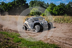 ATV and UTV riding in sandy dusty track. Amateur competitions. 4x4