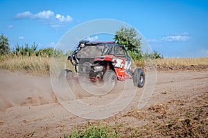 ATV and UTV riding in sandy dusty track. Amateur competitions. 4x4