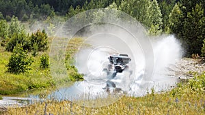 ATV vehicle boosts water hurdle
