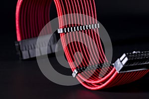 ATX cable for motherboard power on black background