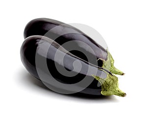 Aubergine or eggplant on white background