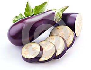 Aubergine with leaves isolated on white