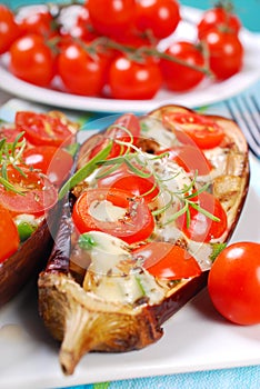 Aubergine stuffed with cherry tomato and mozzarella