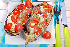 Aubergine stuffed with cherry tomato and mozzarella