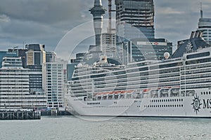MSC Magnifica cruise ship docked in Auckland Downtown ferry terminal and wharf