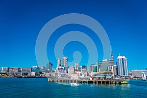 AUCKLAND, NEW ZEALAND- MAY 12, 2017: Beautiful view of the largest and most populous urban area in Auckland with a wharf