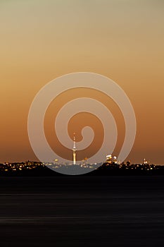 Auckland NZ distant citylight skyline after sunset