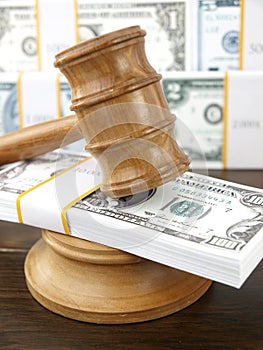Auction gavel and dollars