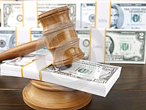 Auction gavel and dollars