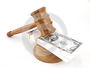 Auction gavel and dollars