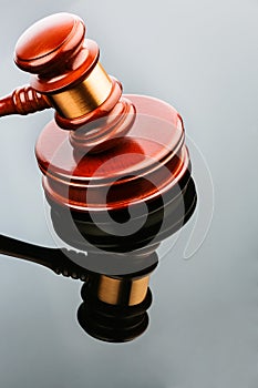 Auction hammer reflected