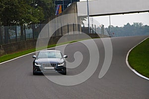 Audi S5 sportscar driving on track