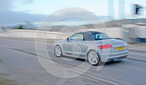 Audi sports car with motion blur.