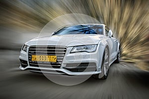 Audi A7 white car.