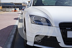 Audi white car in street