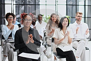 Audience Applauding a Great Speaker at Business convention and Presentation