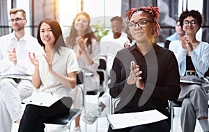 Audience Applauding a Great Speaker at Business convention and Presentation