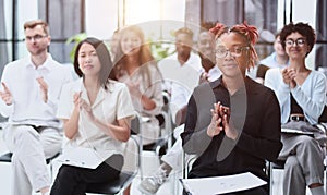 Audience Applauding a Great Speaker at Business convention and Presentation