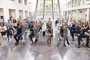 Audience Applauding Speaker After Conference Presentation