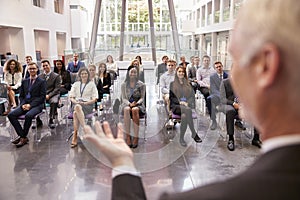 Audience Applauding Speaker After Conference Presentation