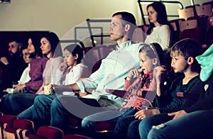 Audience attending movie night for comedy